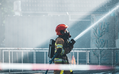 Firefighter with extinguisher
