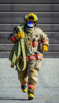 Firefighter with extinguisher