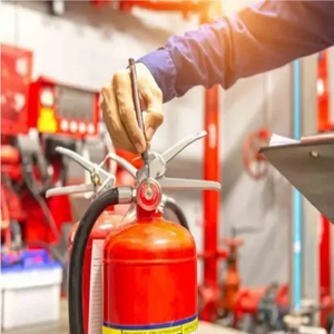 Firefighter with extinguisher